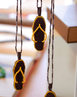 THE CHANCLA TOTEM